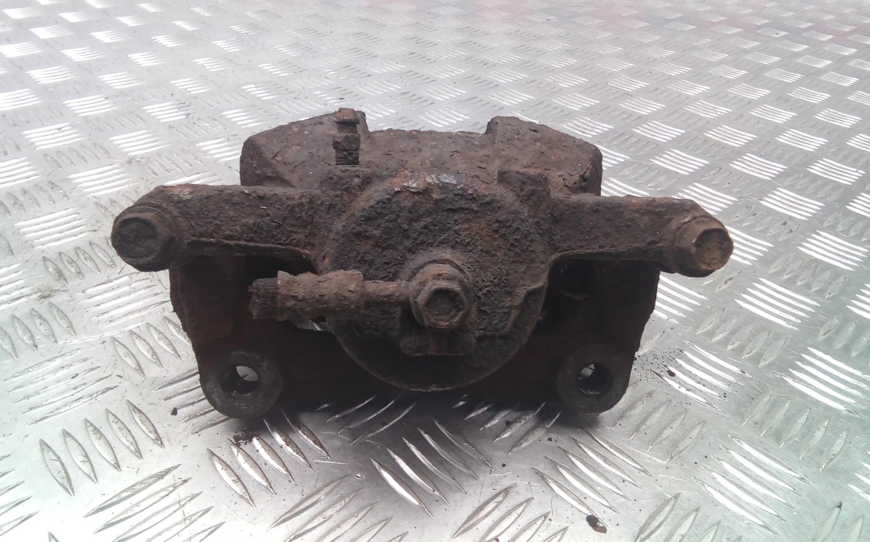 Суппорт передний левый