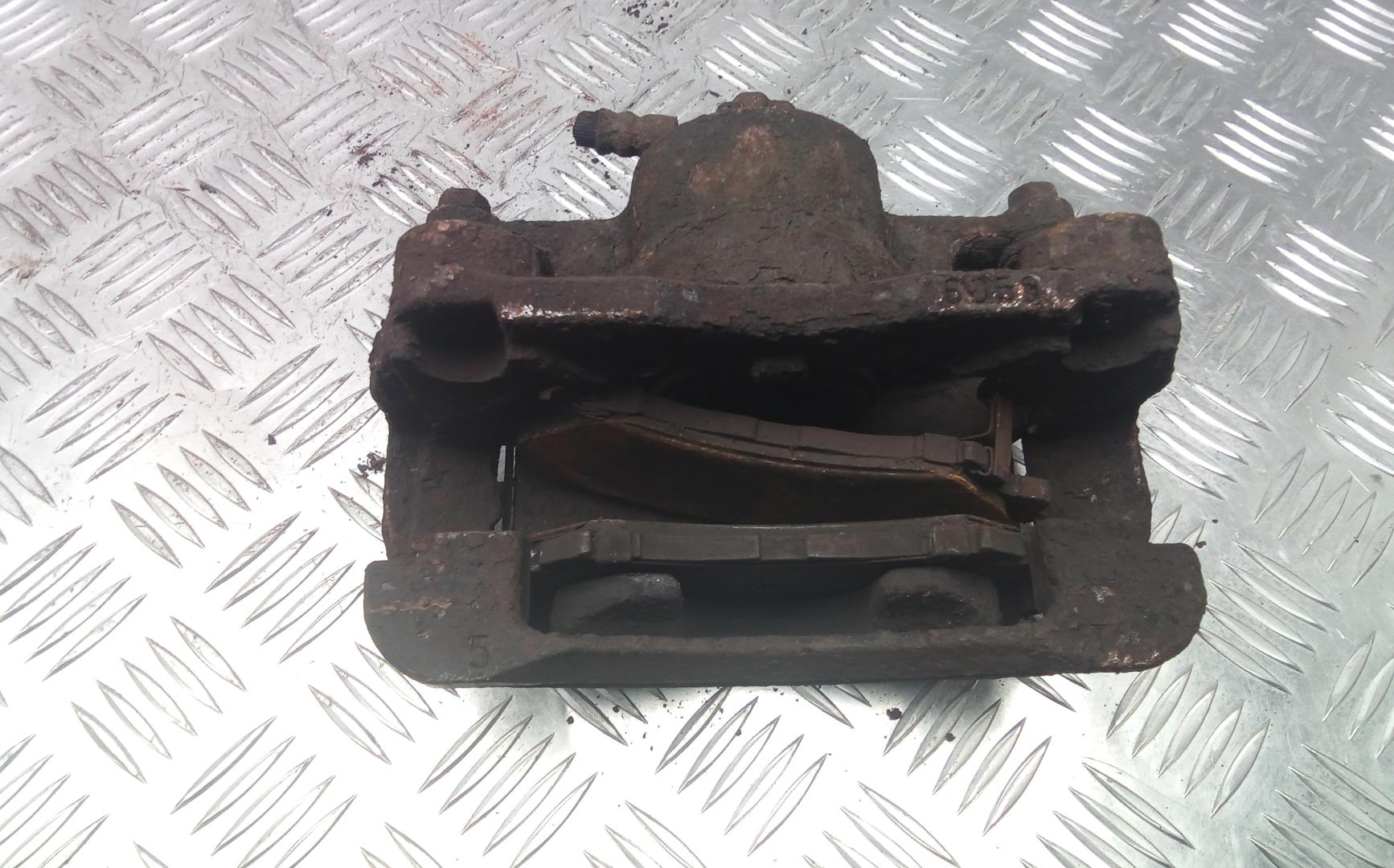 Суппорт передний левый