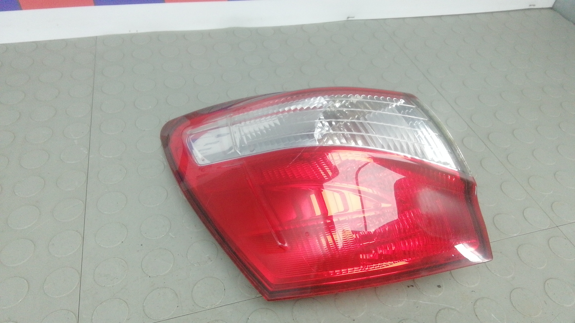 Фонарь задний левый