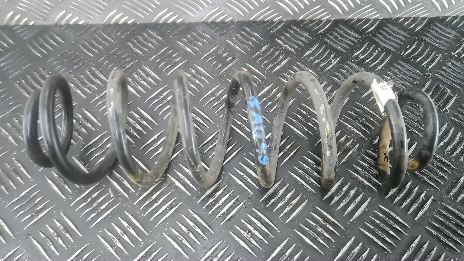 Пружина задняя