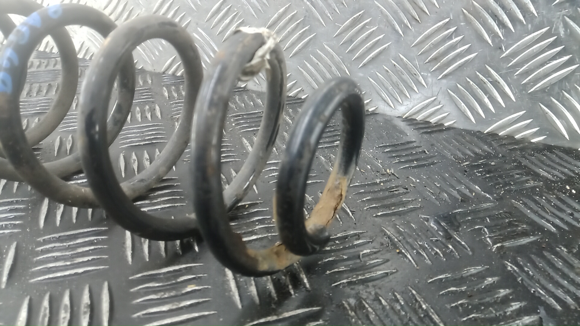 Пружина задняя