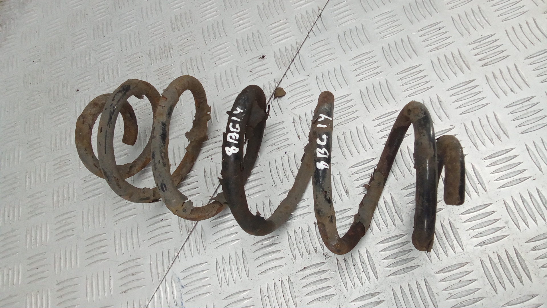 Пружина задняя