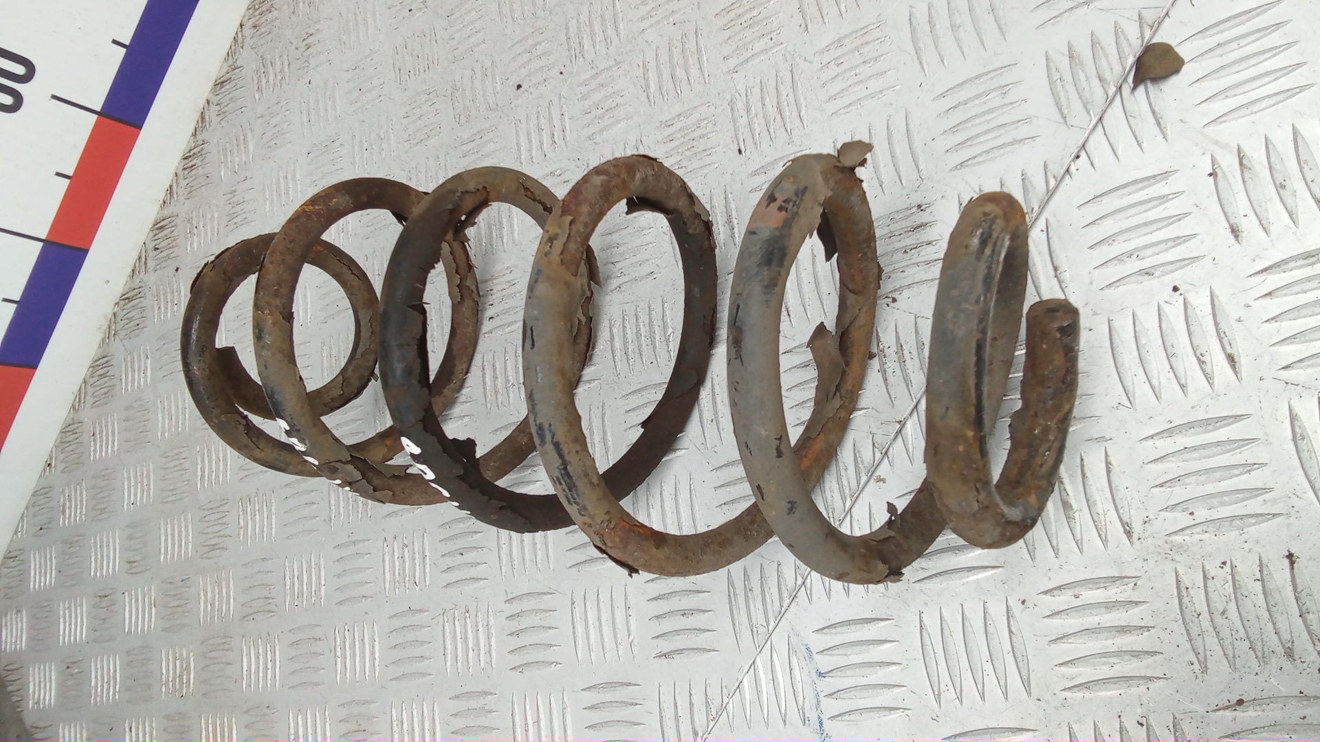 Пружина задняя