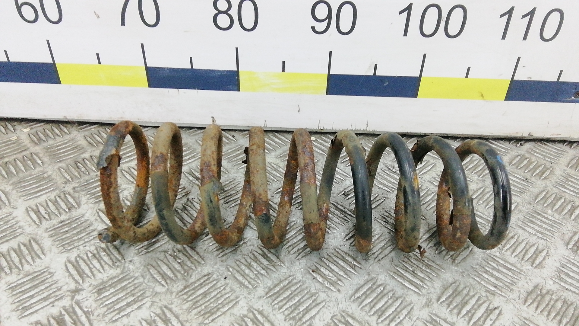 Пружина задняя