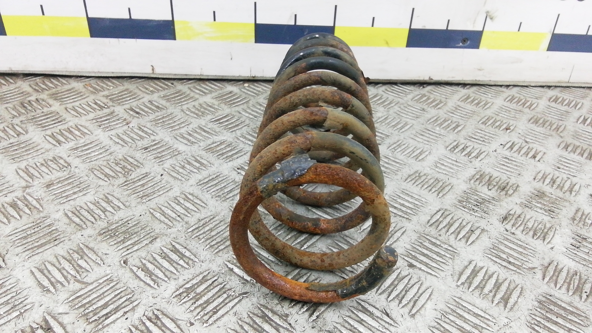 Пружина задняя