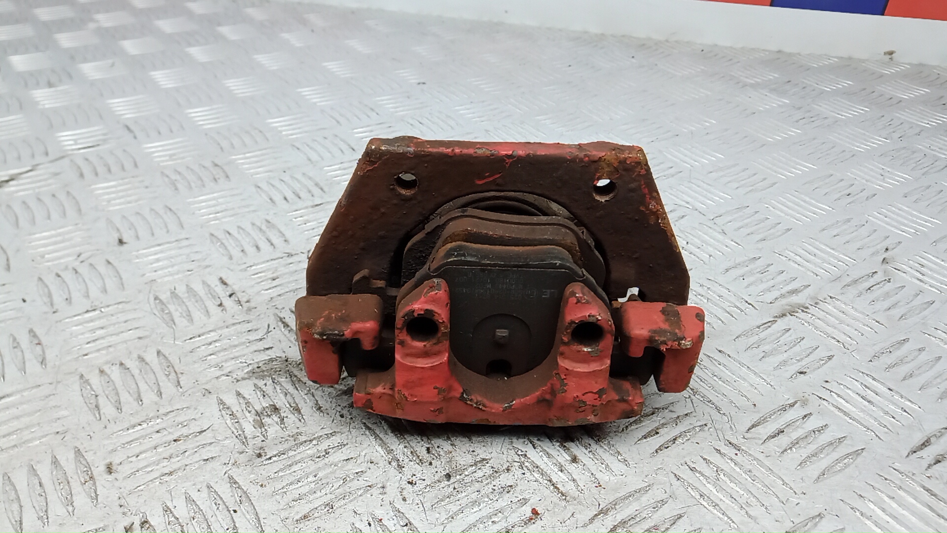 Суппорт задний левый