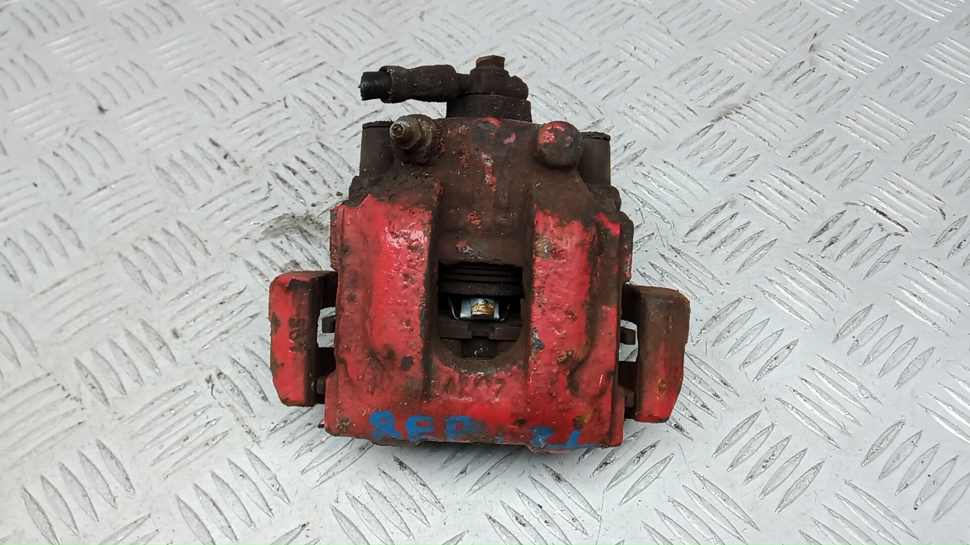 Суппорт задний левый