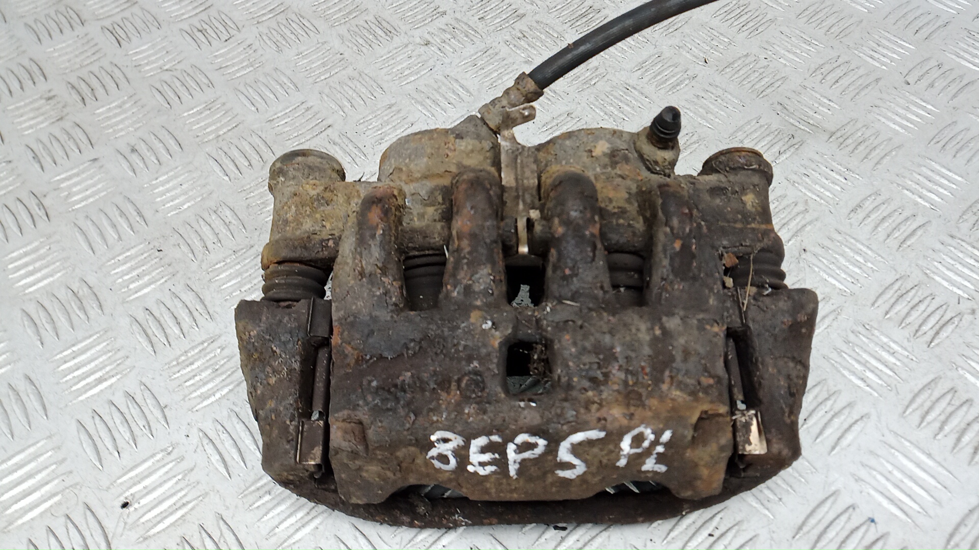 Суппорт передний левый