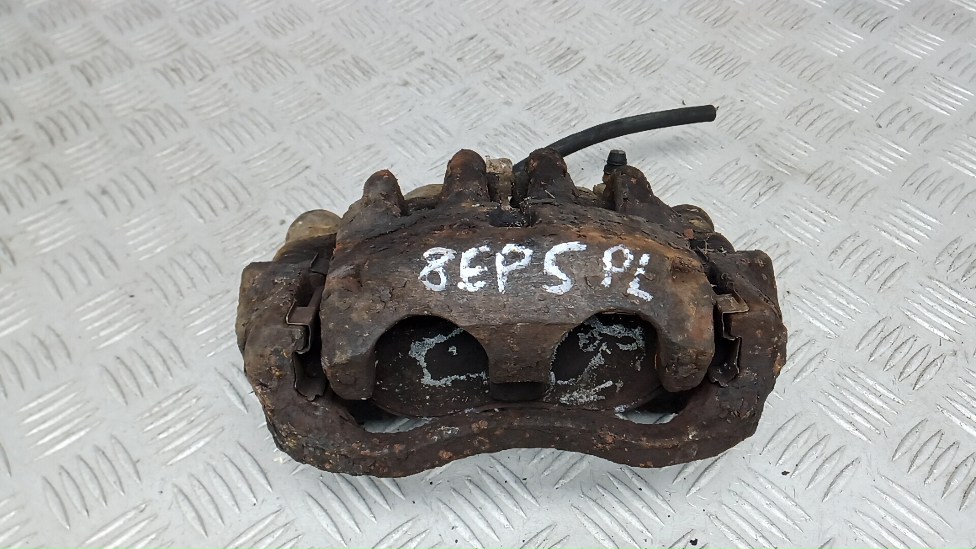 Суппорт передний левый