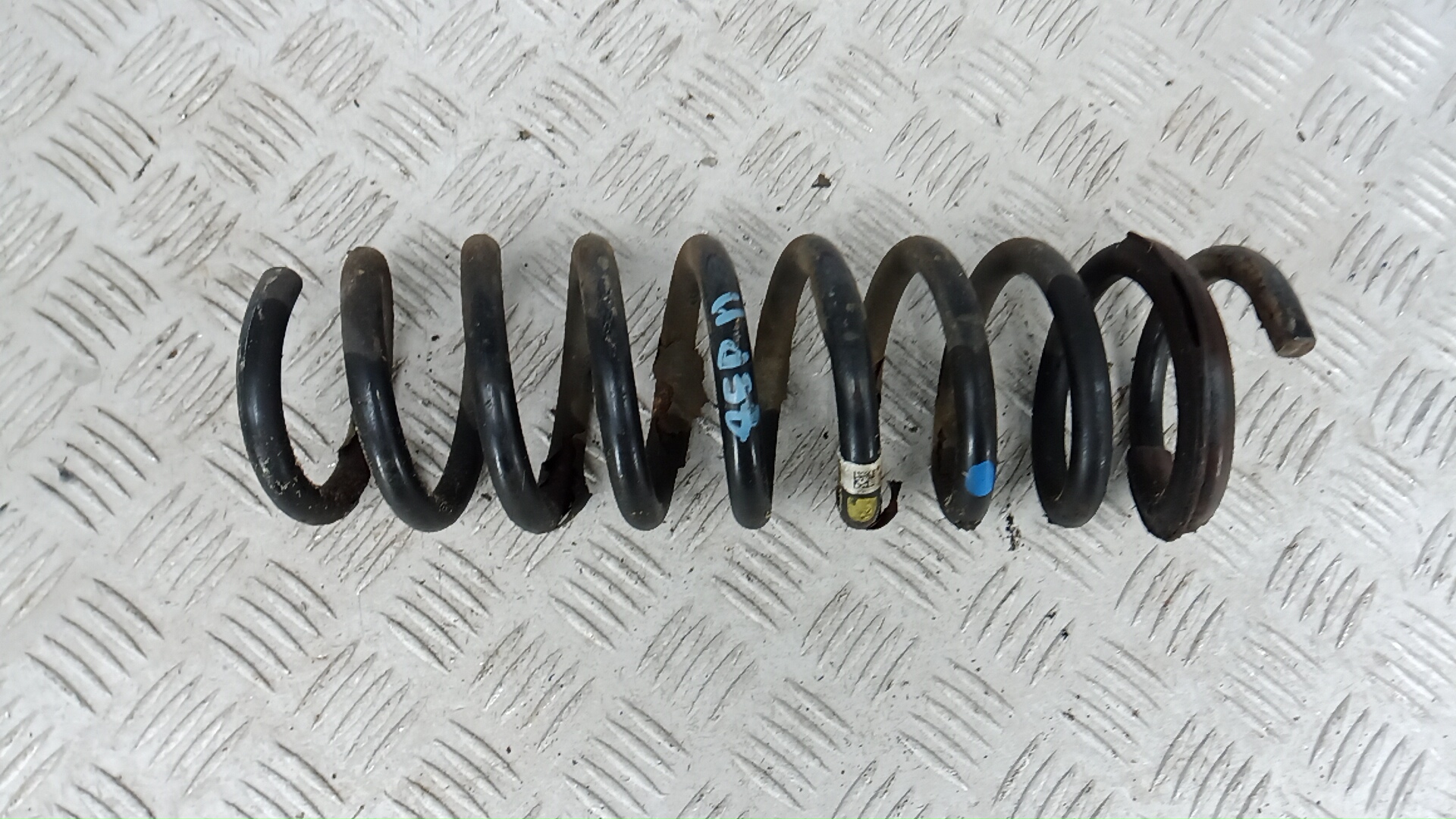 Пружина задняя