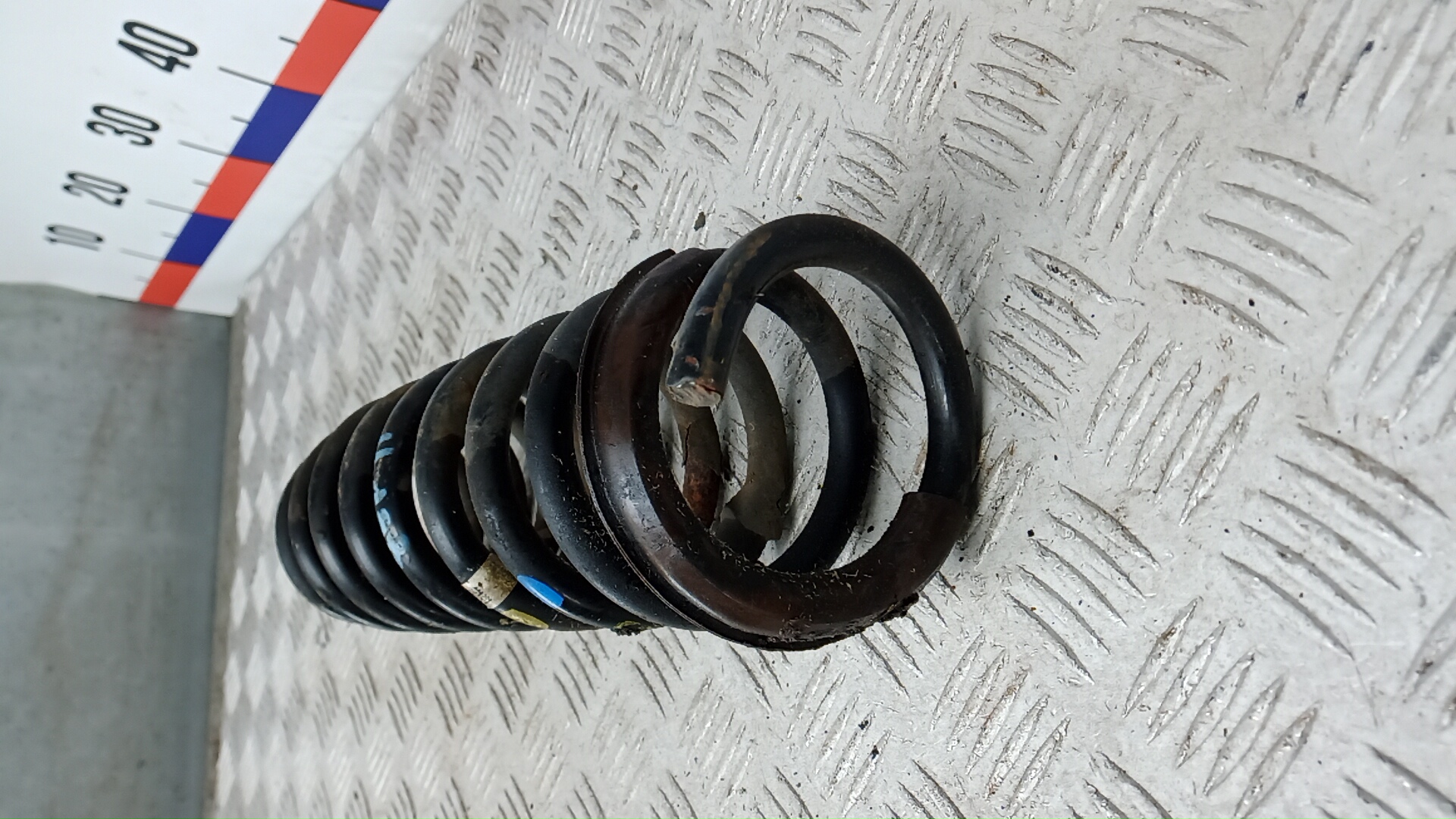 Пружина задняя