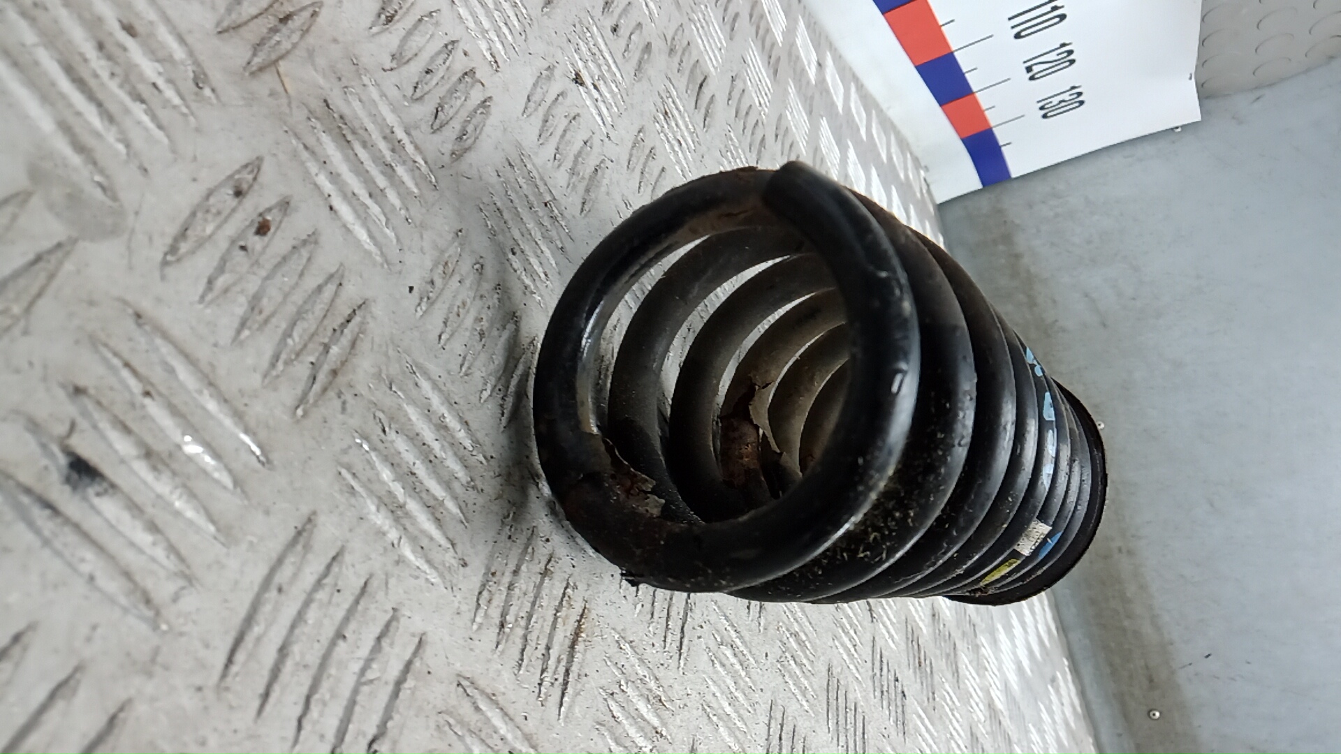 Пружина задняя