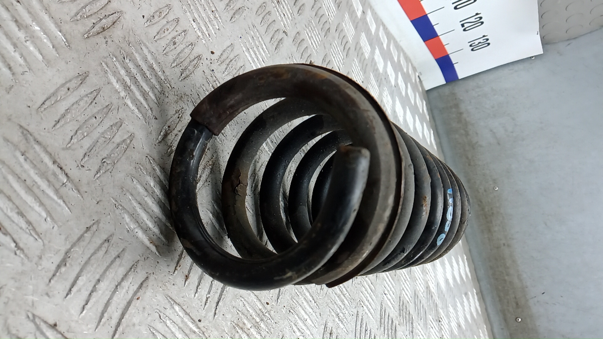 Пружина задняя