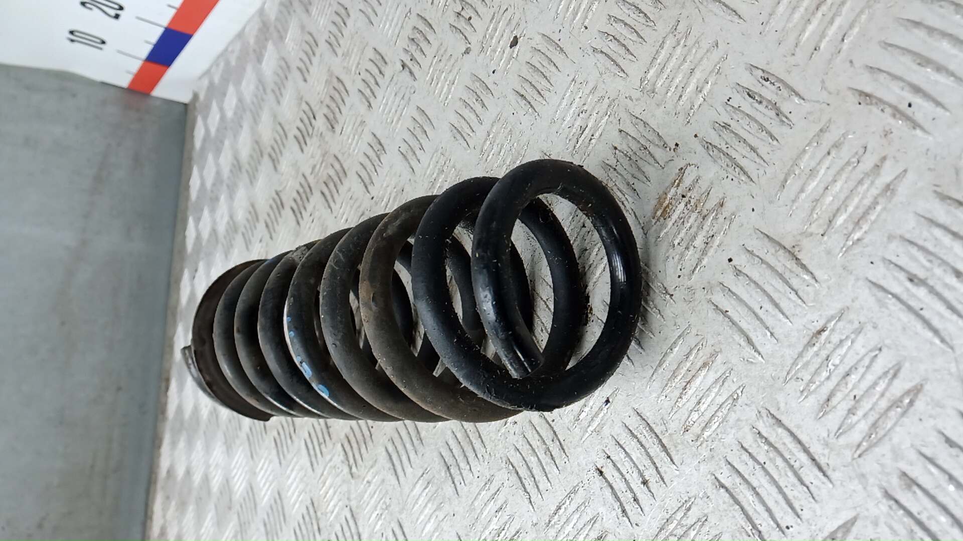 Пружина задняя