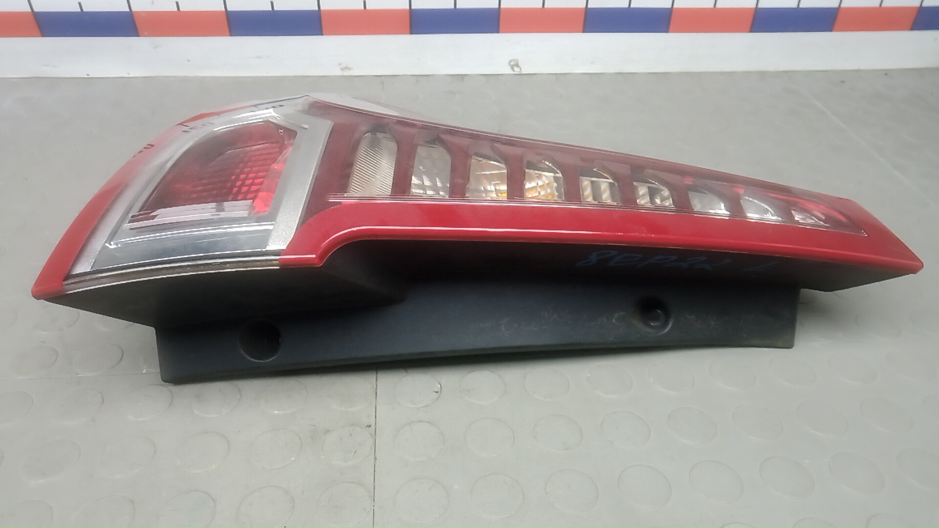 Фонарь задний левый