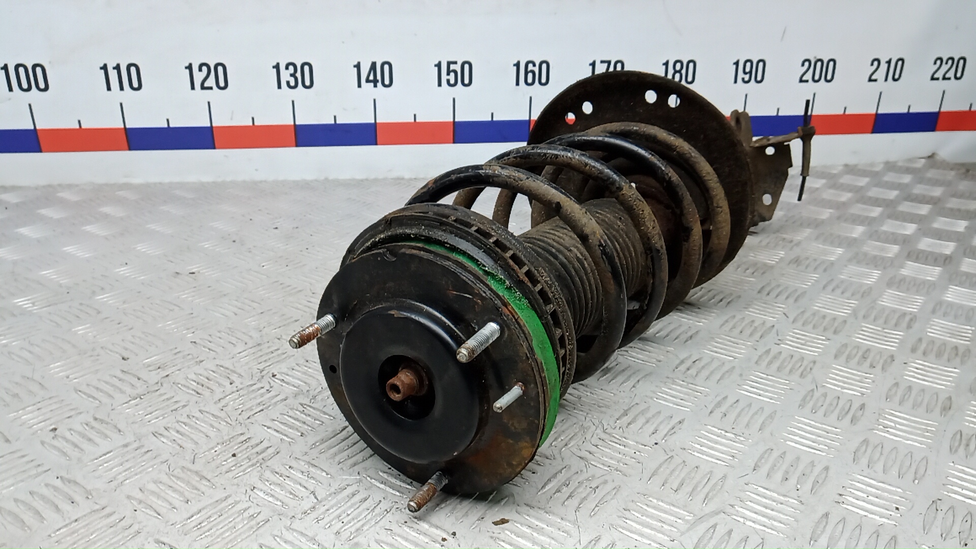 Амортизатор передний левый