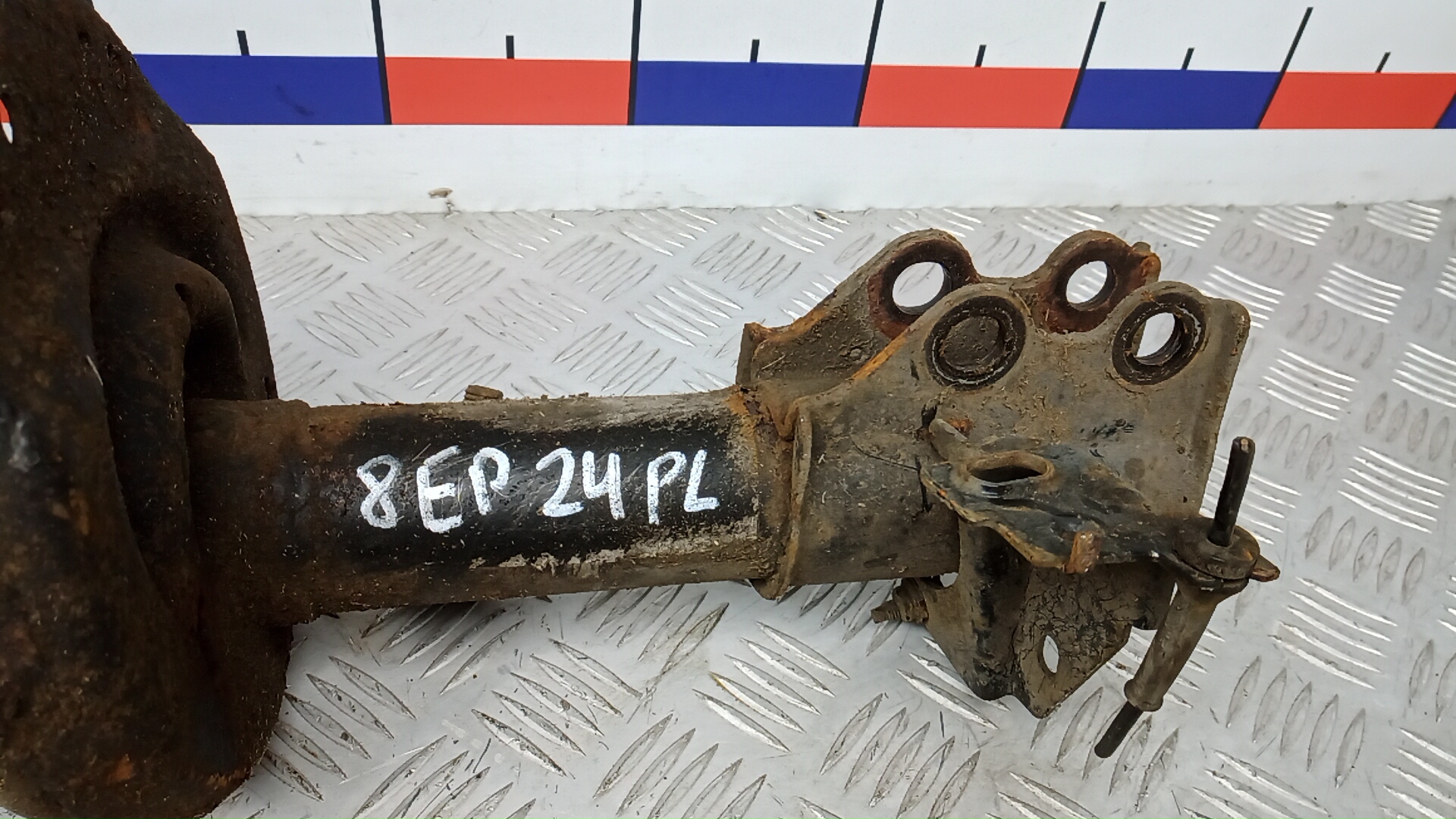 Амортизатор передний левый