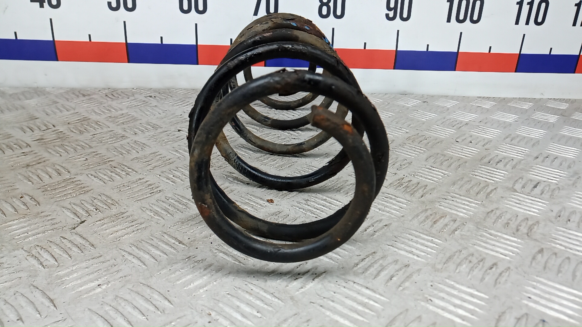 Пружина задняя