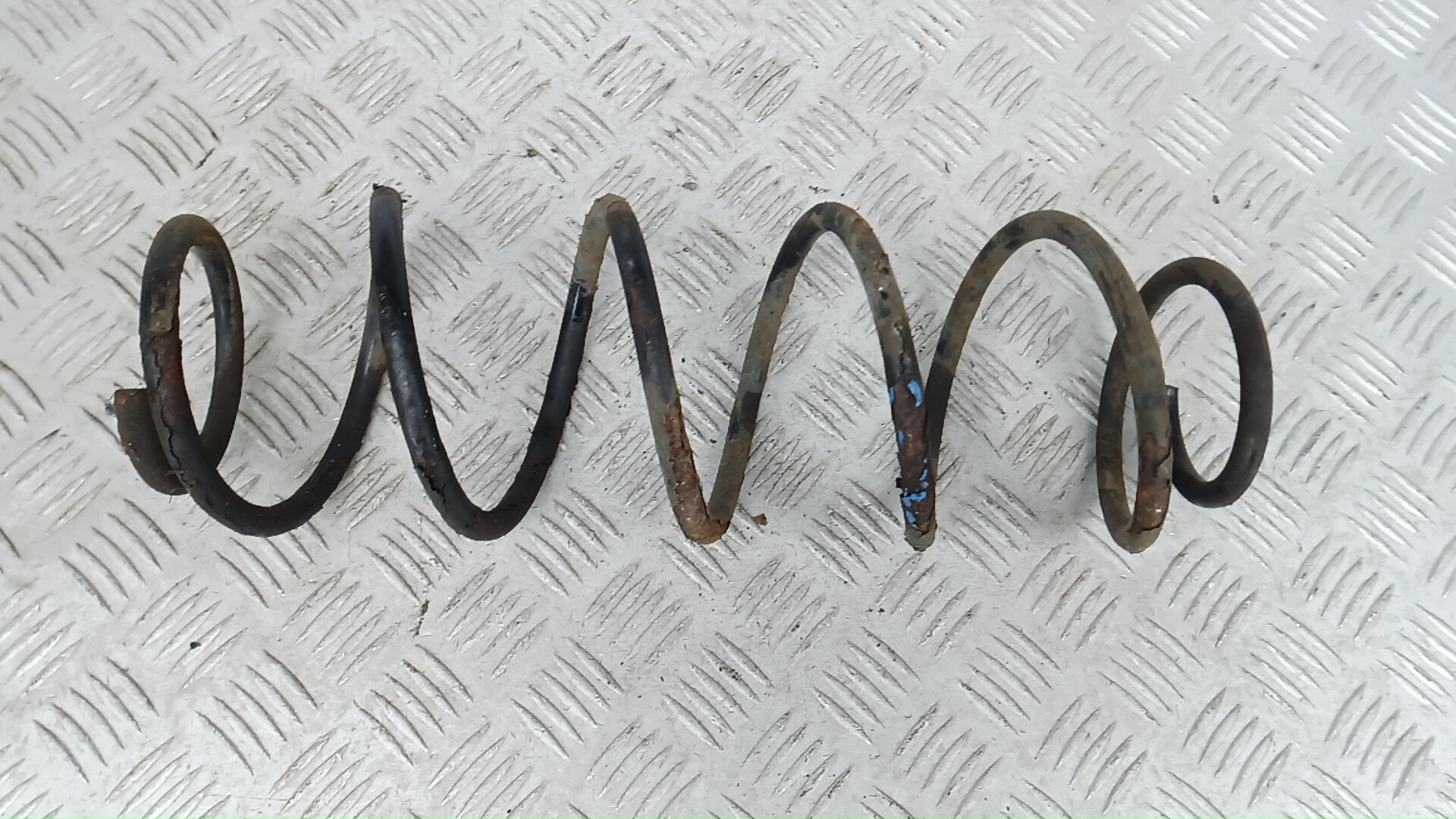 Пружина задняя