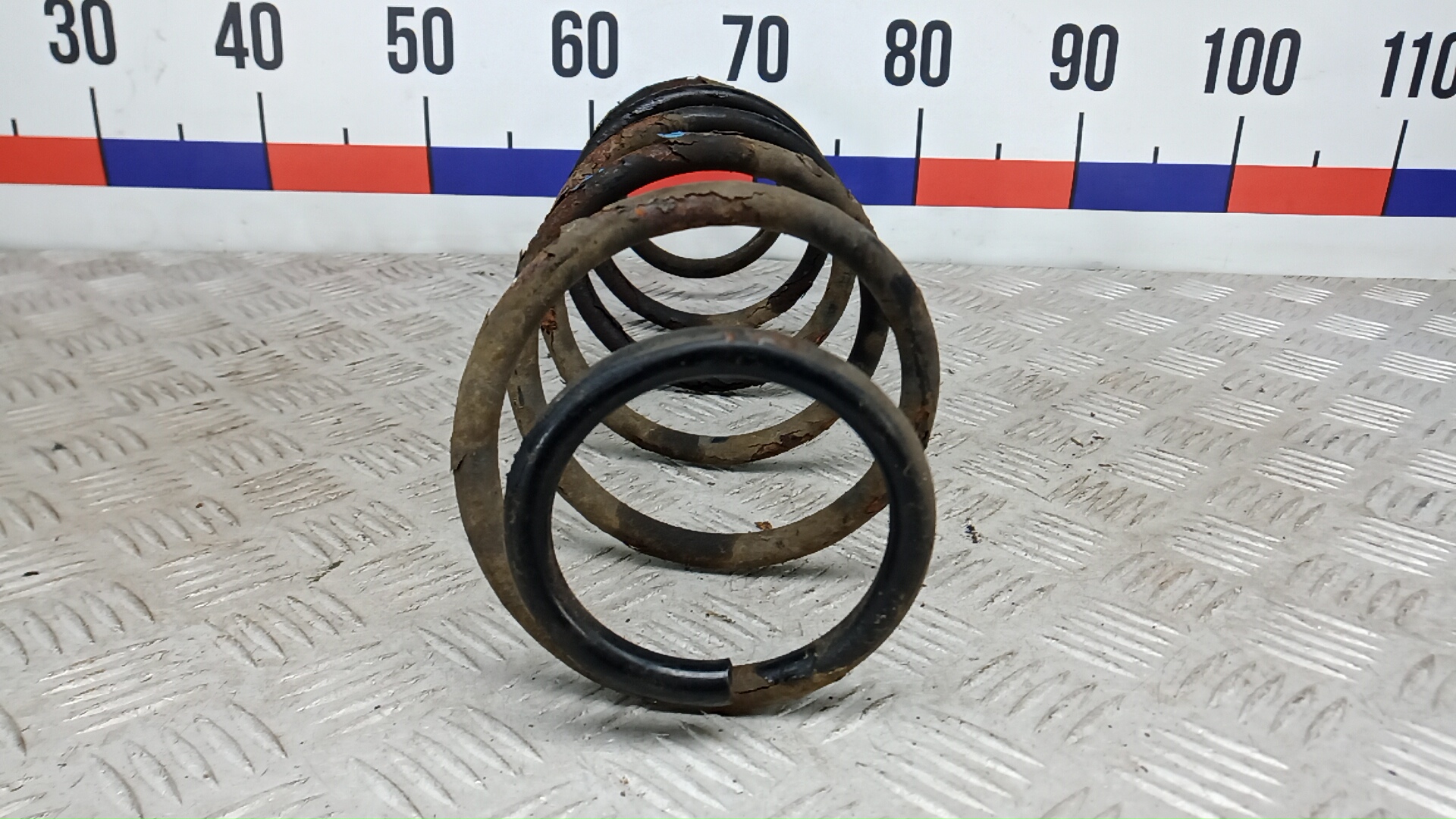 Пружина задняя