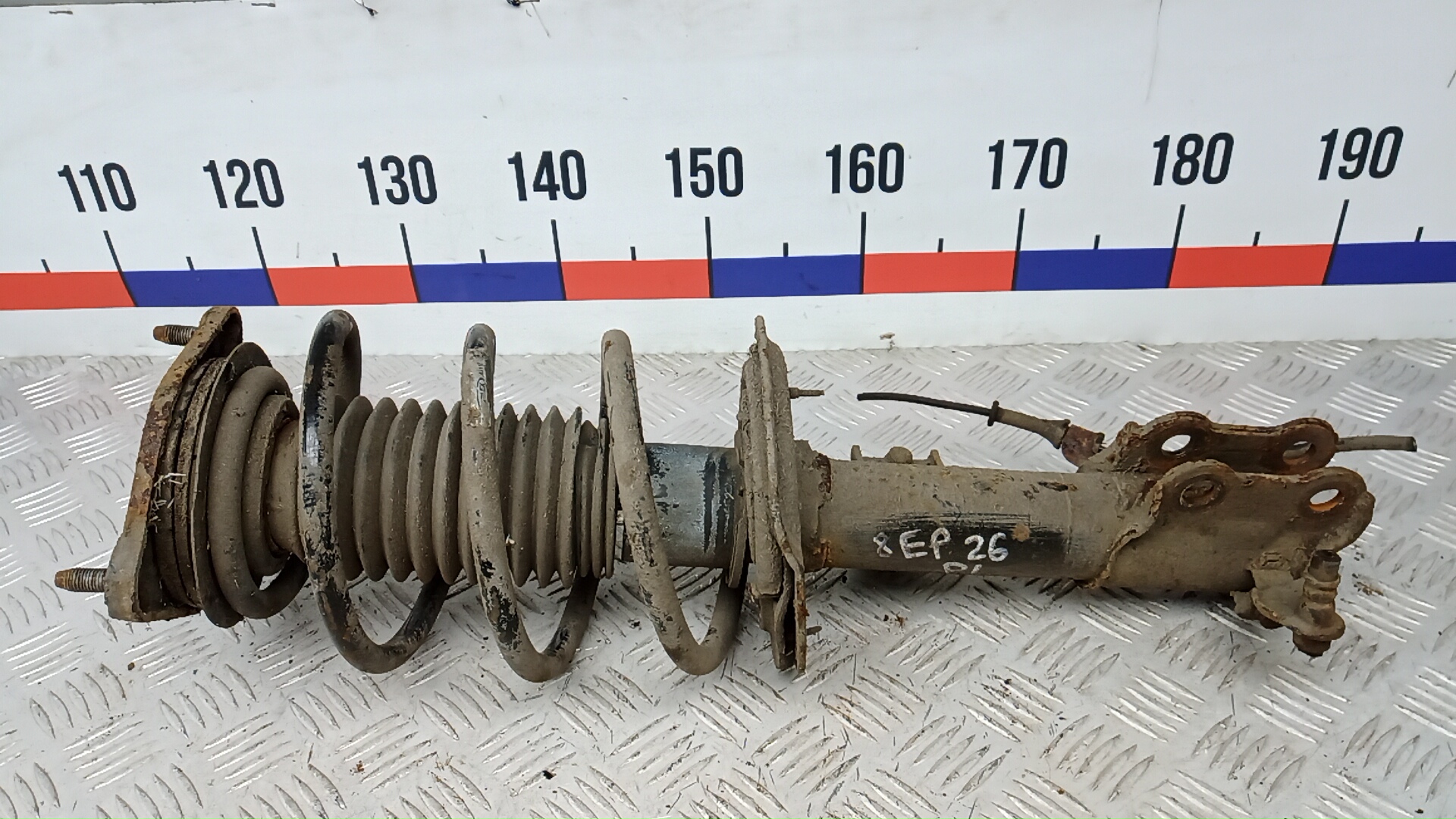 Амортизатор передний левый