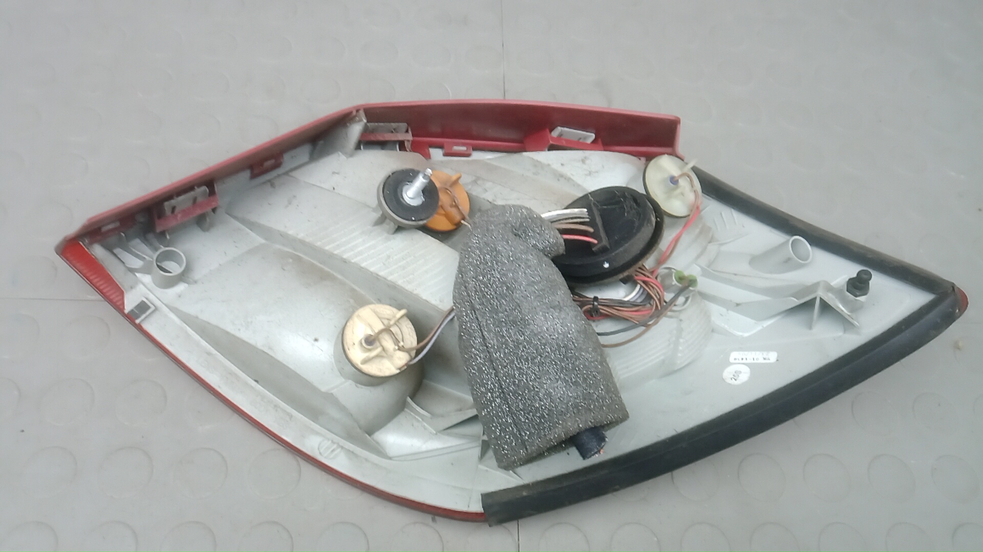 Фонарь задний левый