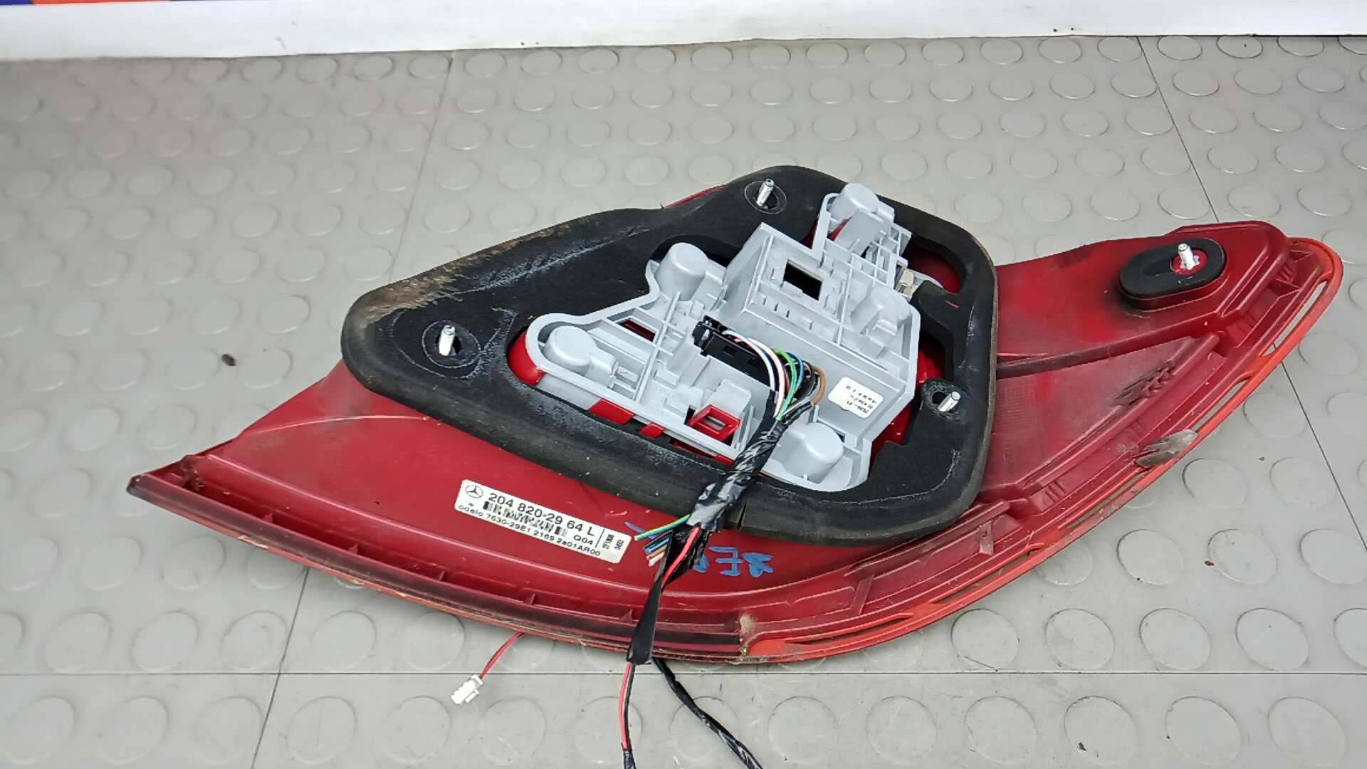 Фонарь задний левый