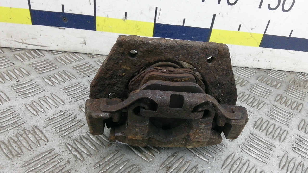 Суппорт задний левый