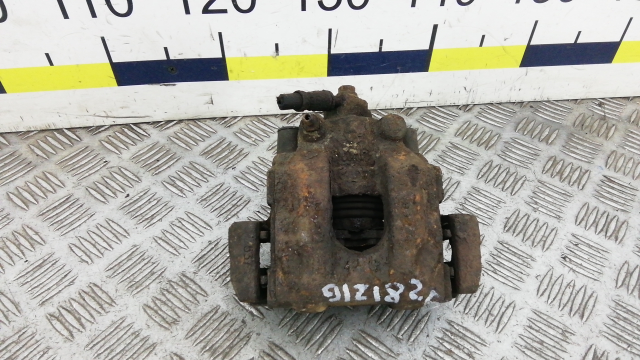 Суппорт задний левый