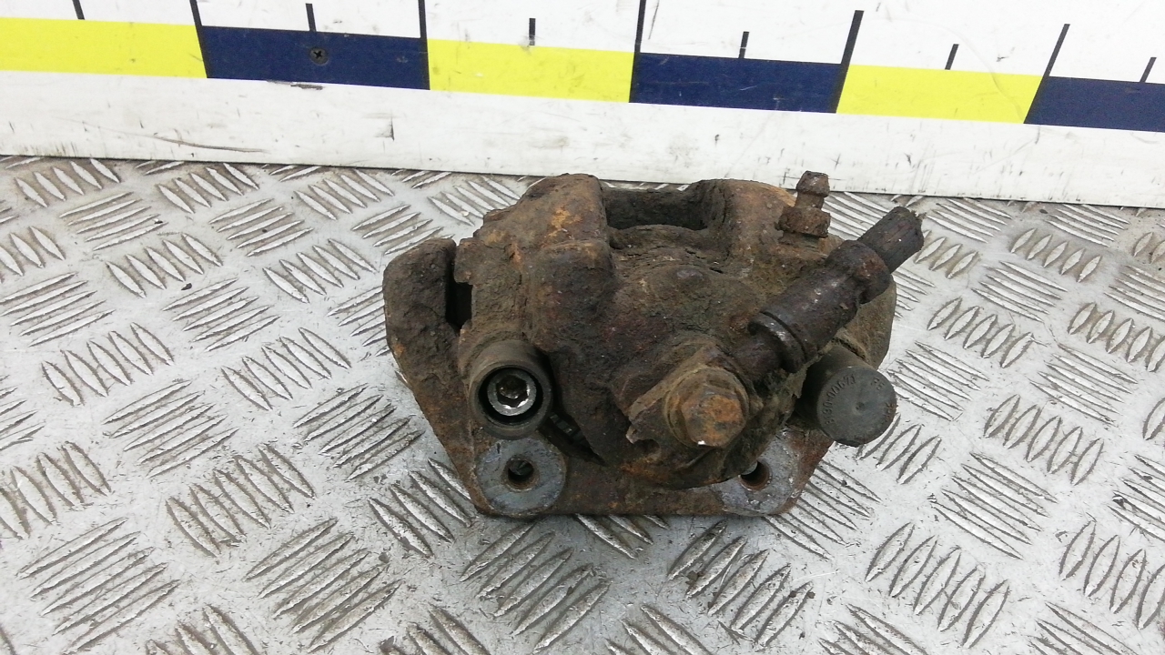 Суппорт задний левый