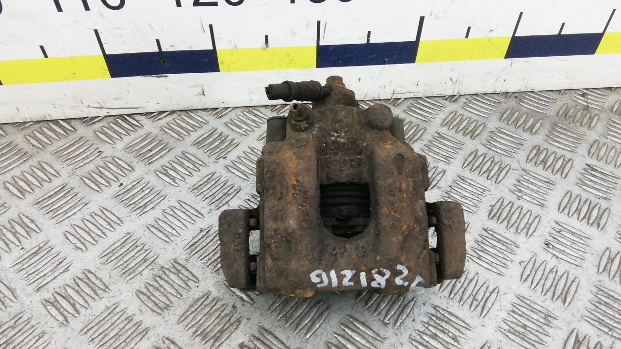 Суппорт задний левый