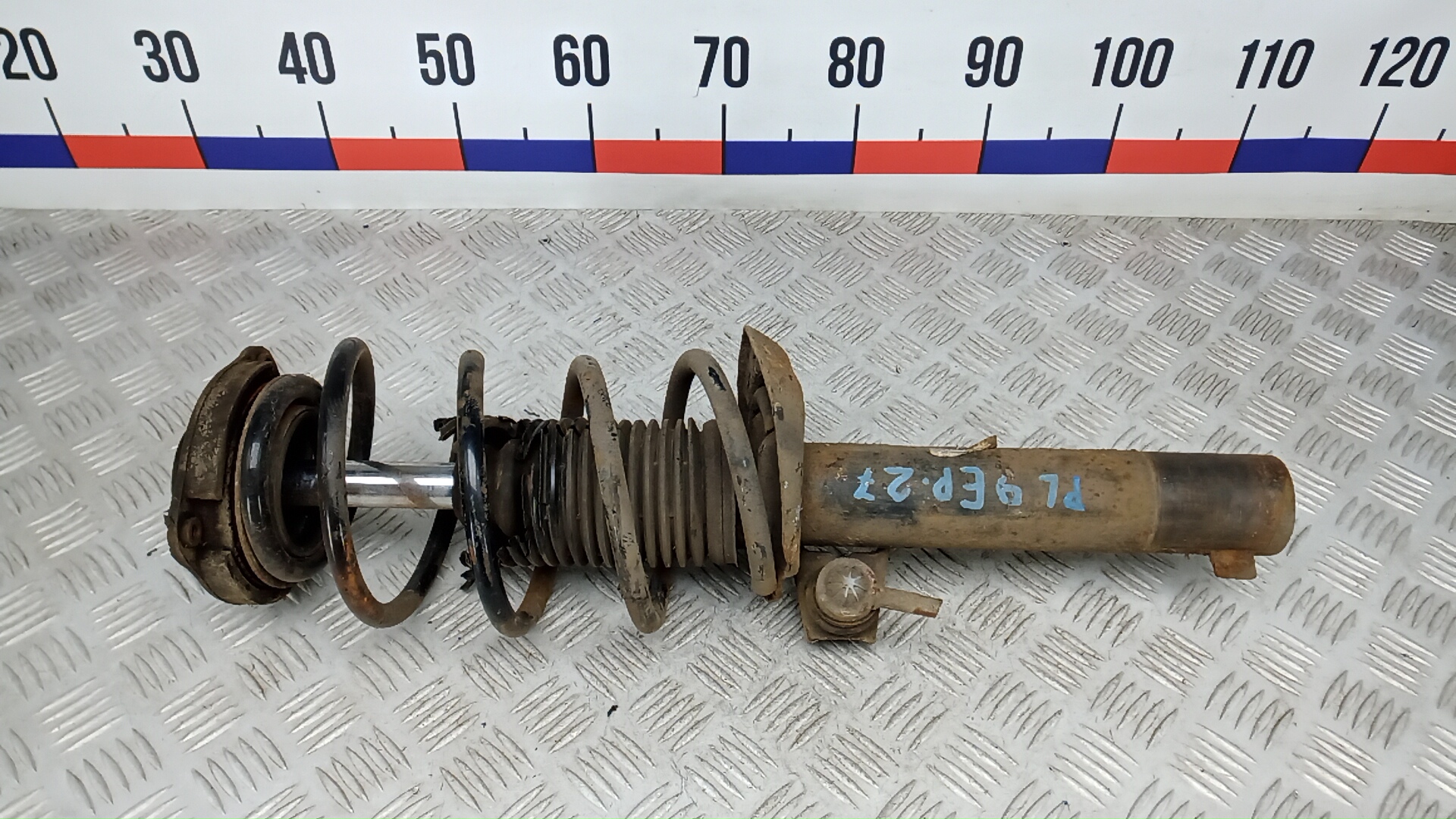 Амортизатор передний левый