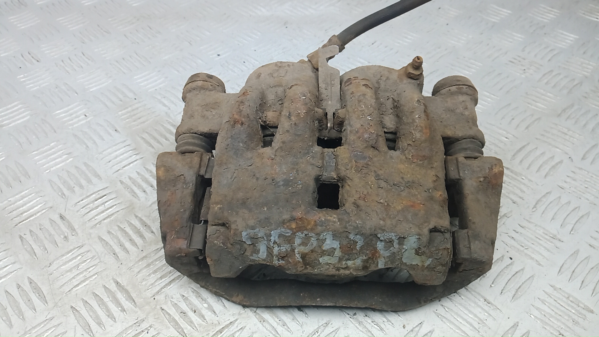 Суппорт передний левый