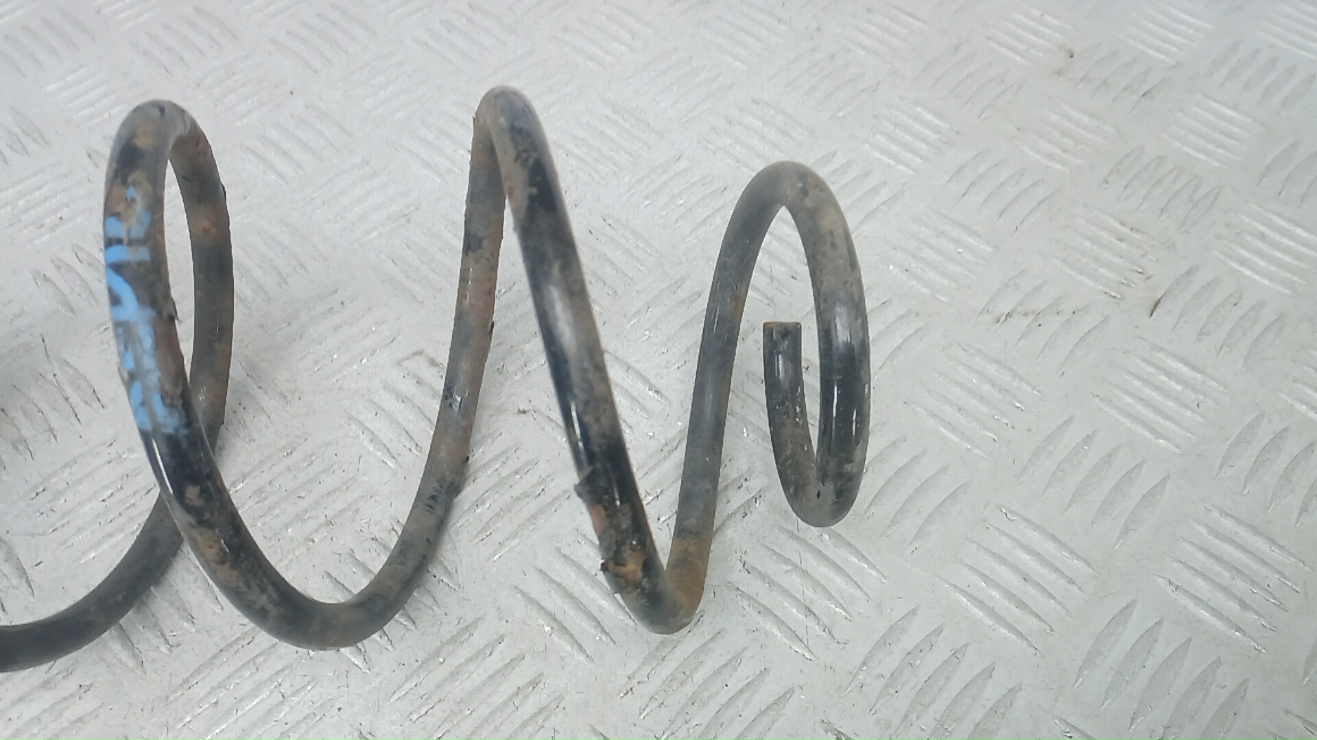 Пружина задняя