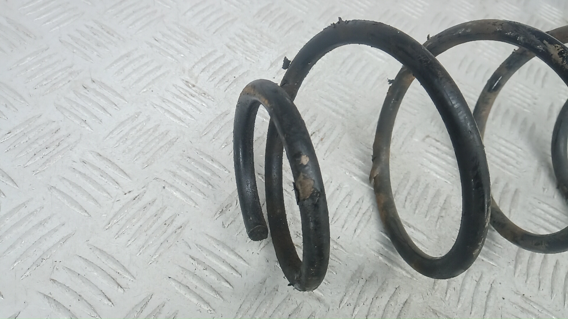 Пружина задняя