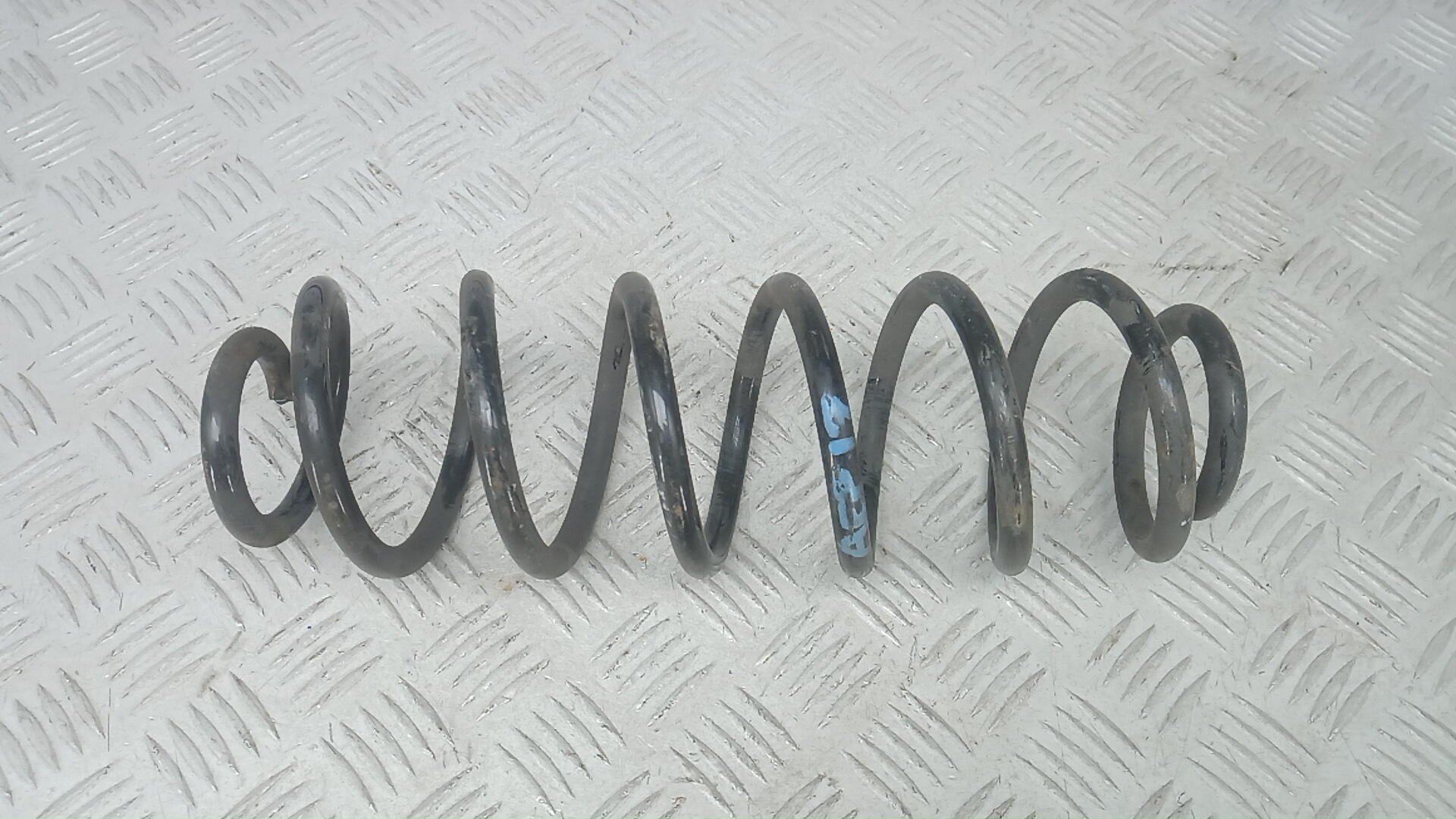 Пружина задняя