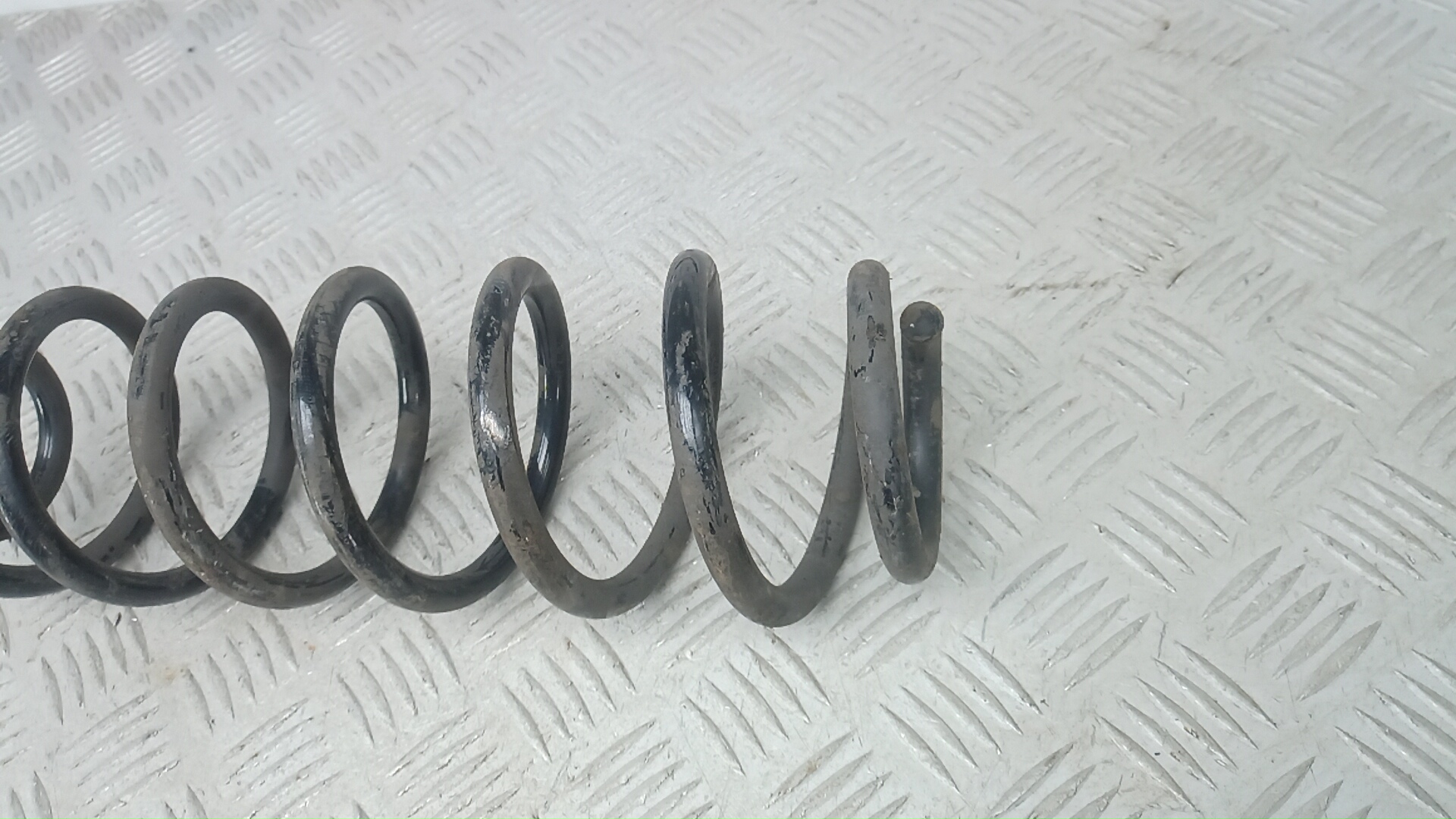 Пружина задняя