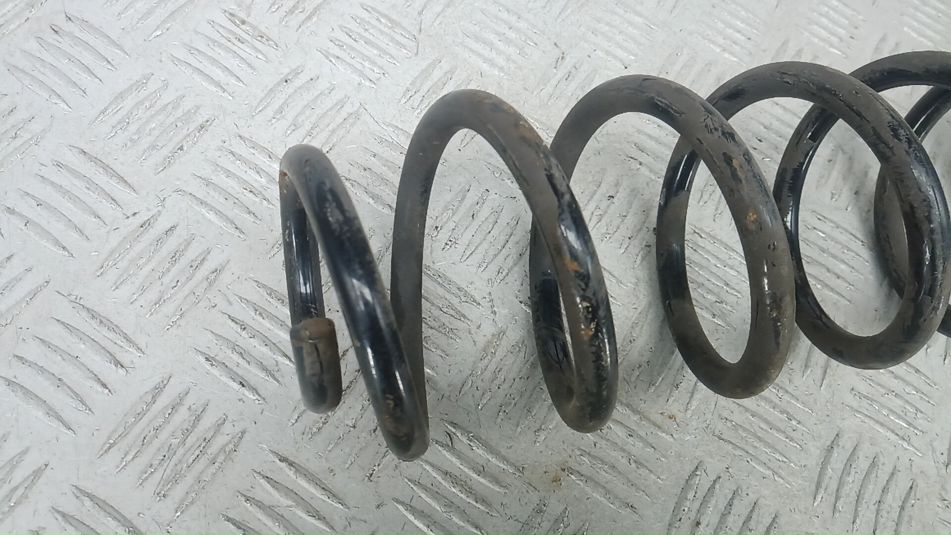 Пружина задняя