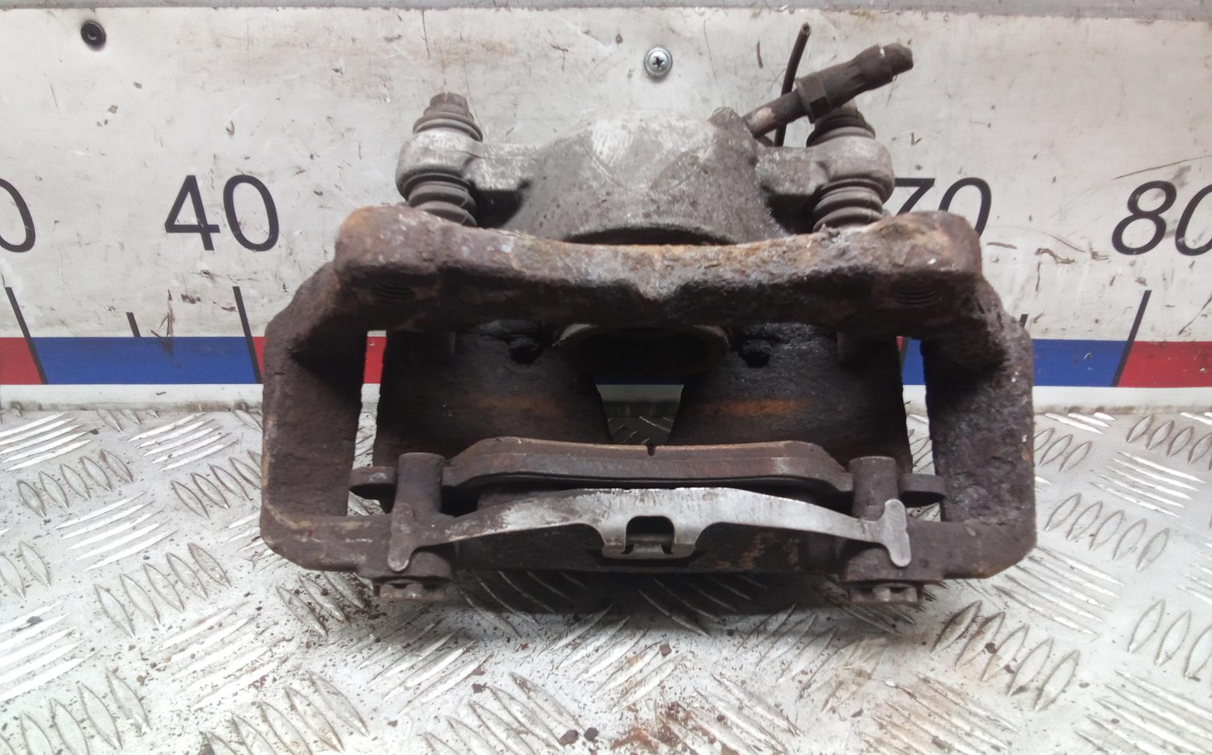 Суппорт передний левый