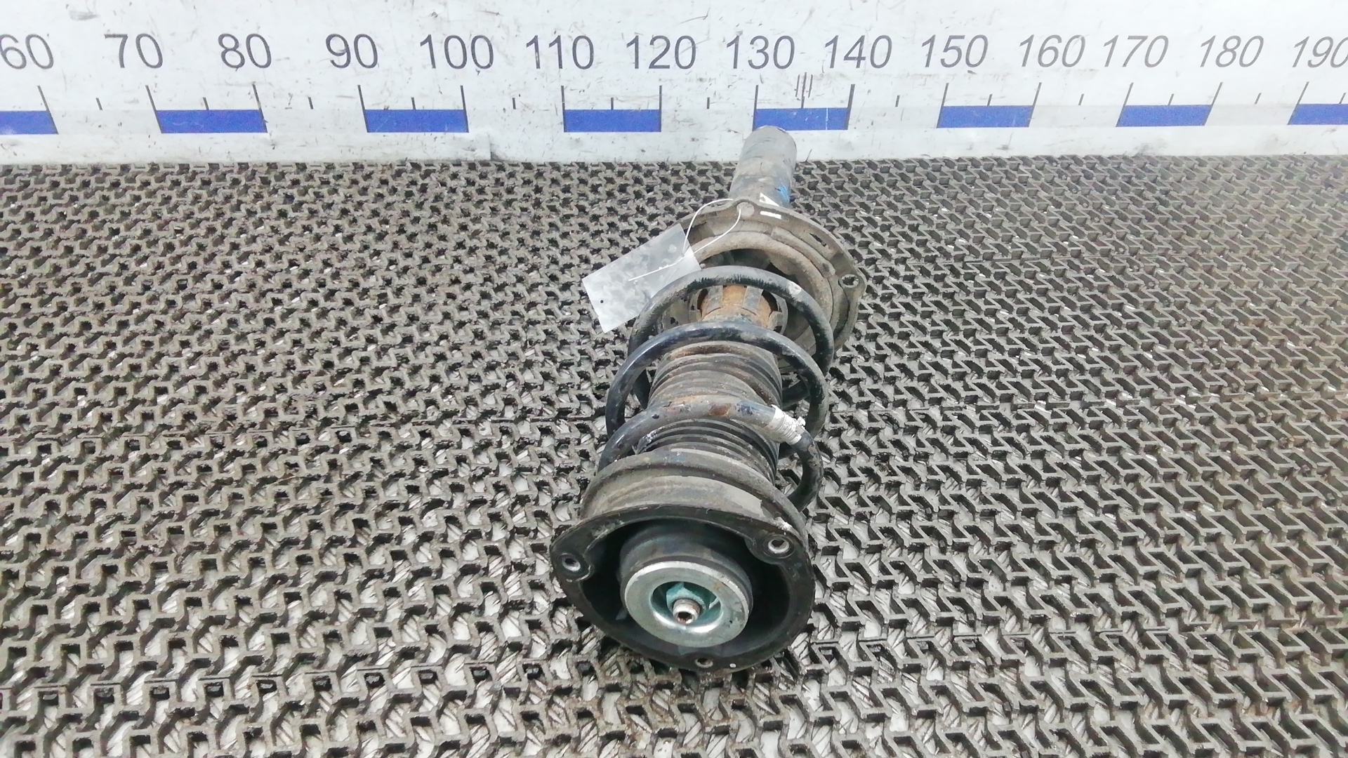 Амортизатор передний левый