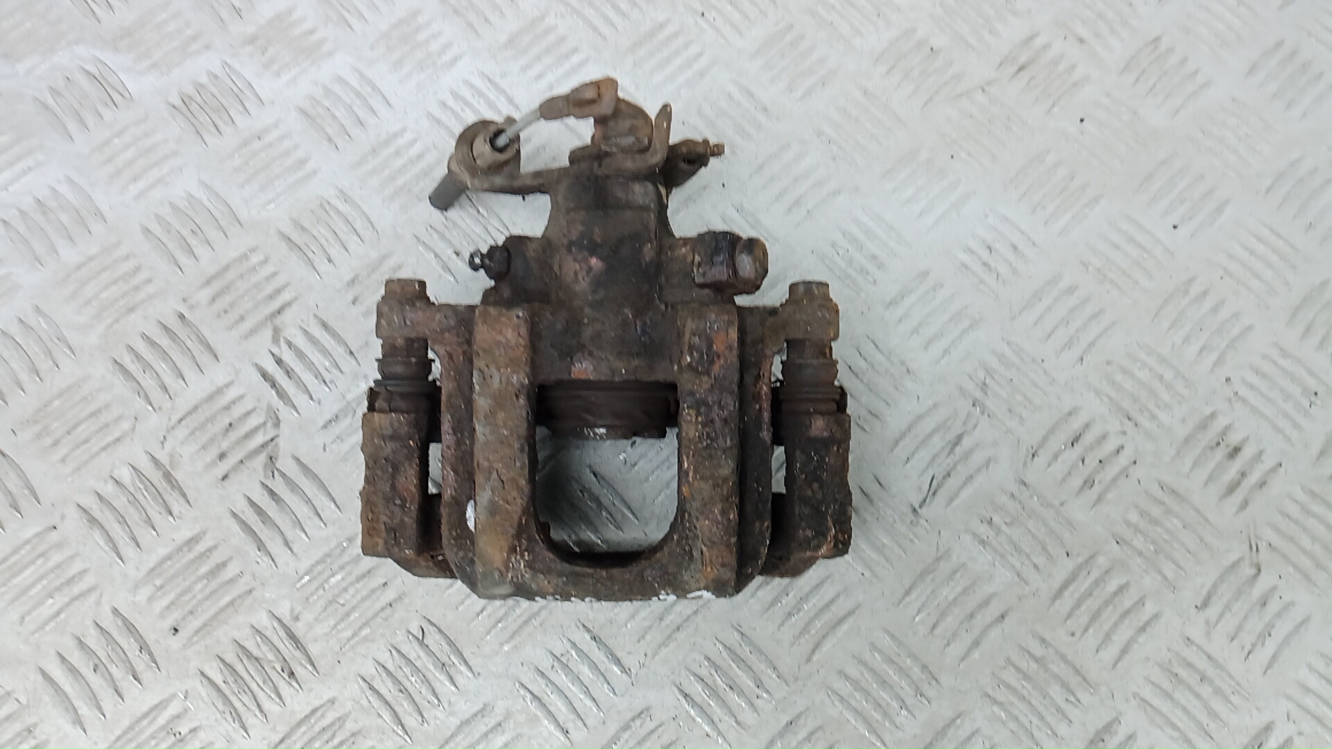 Суппорт задний левый