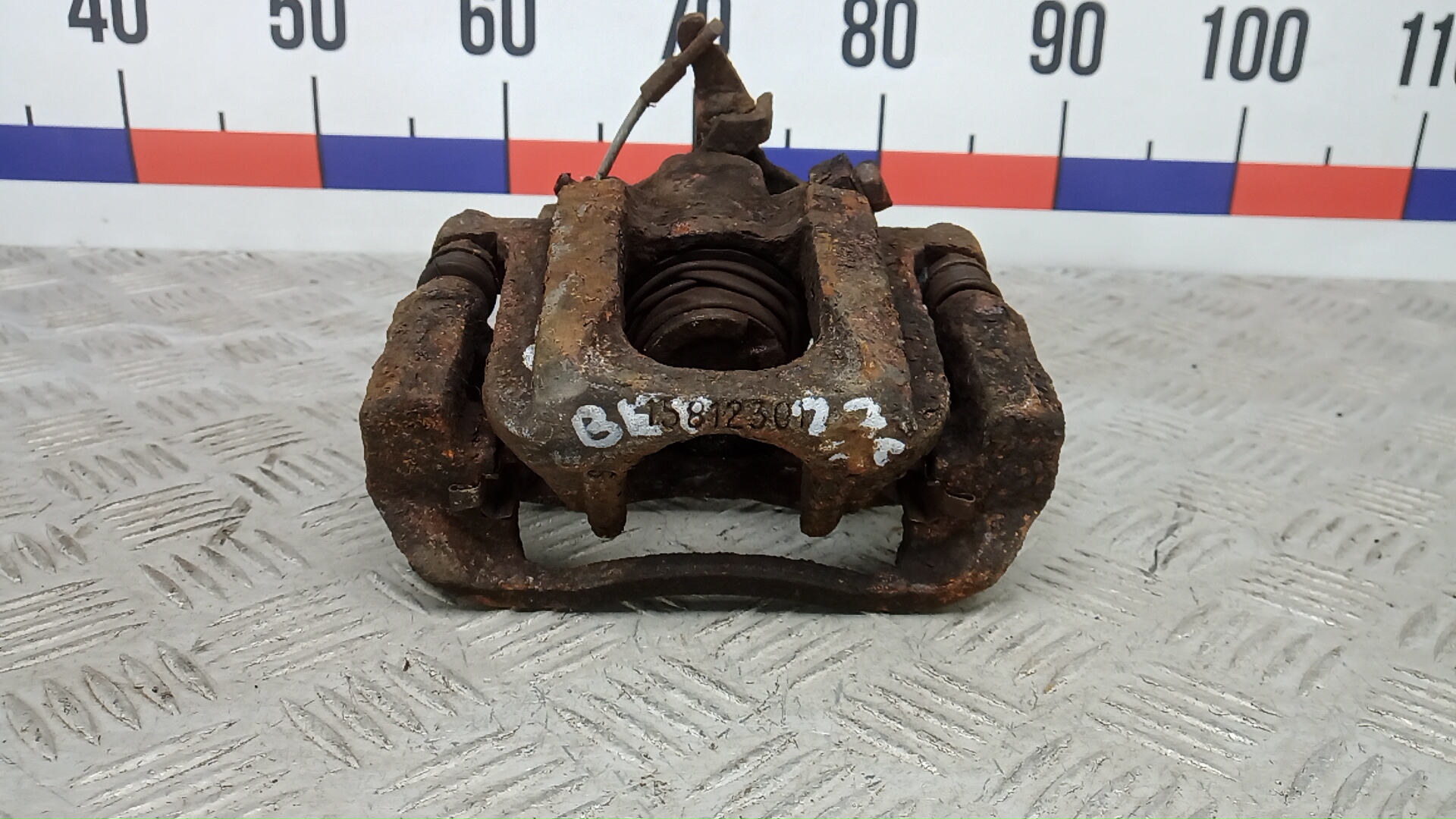 Суппорт задний левый