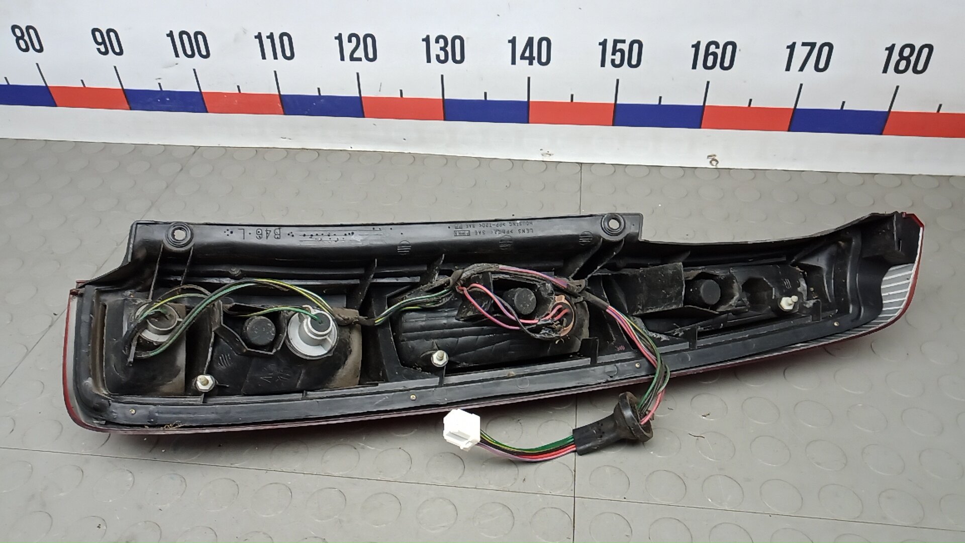 Фонарь задний левый