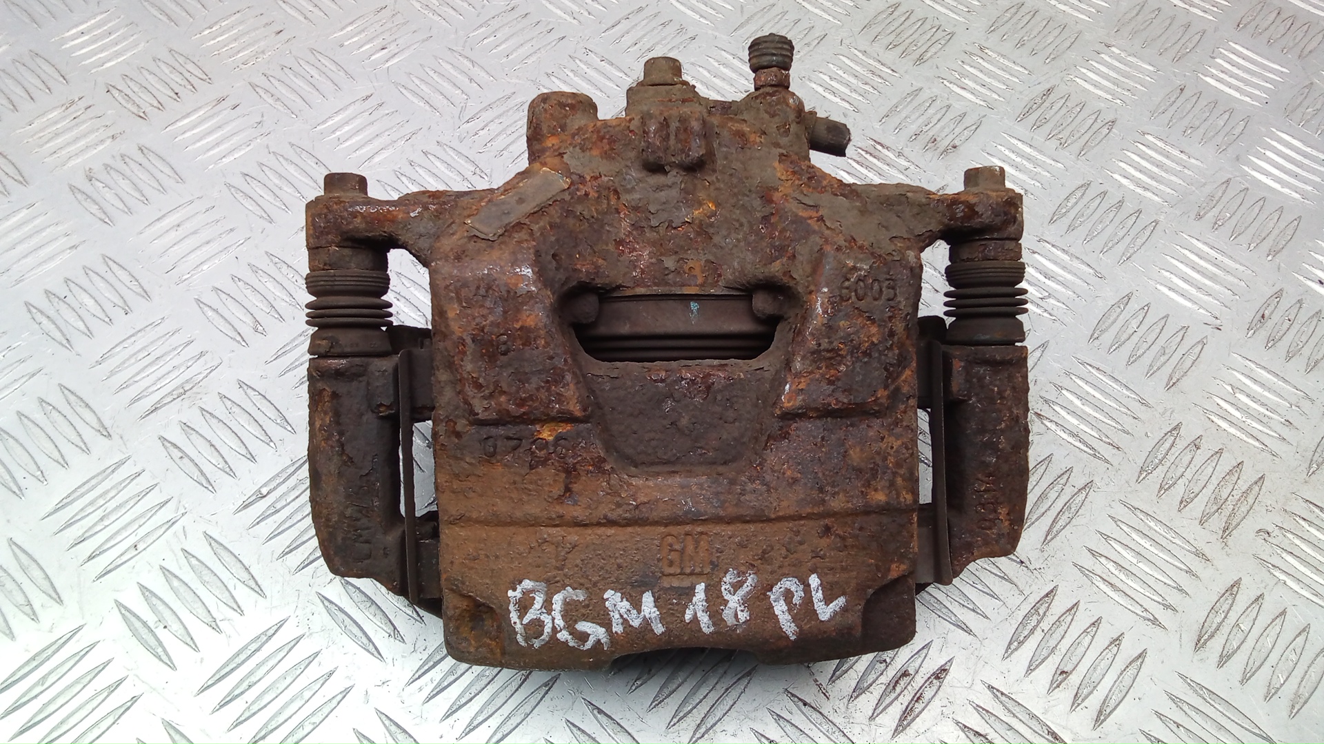 Суппорт передний левый