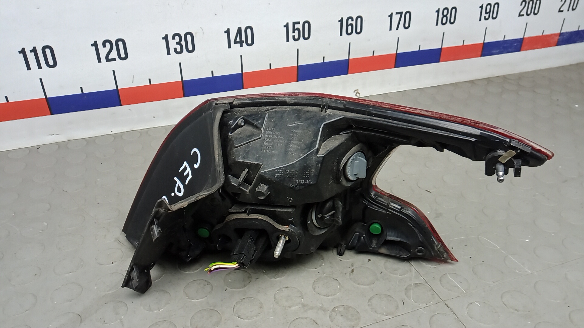 Фонарь задний левый