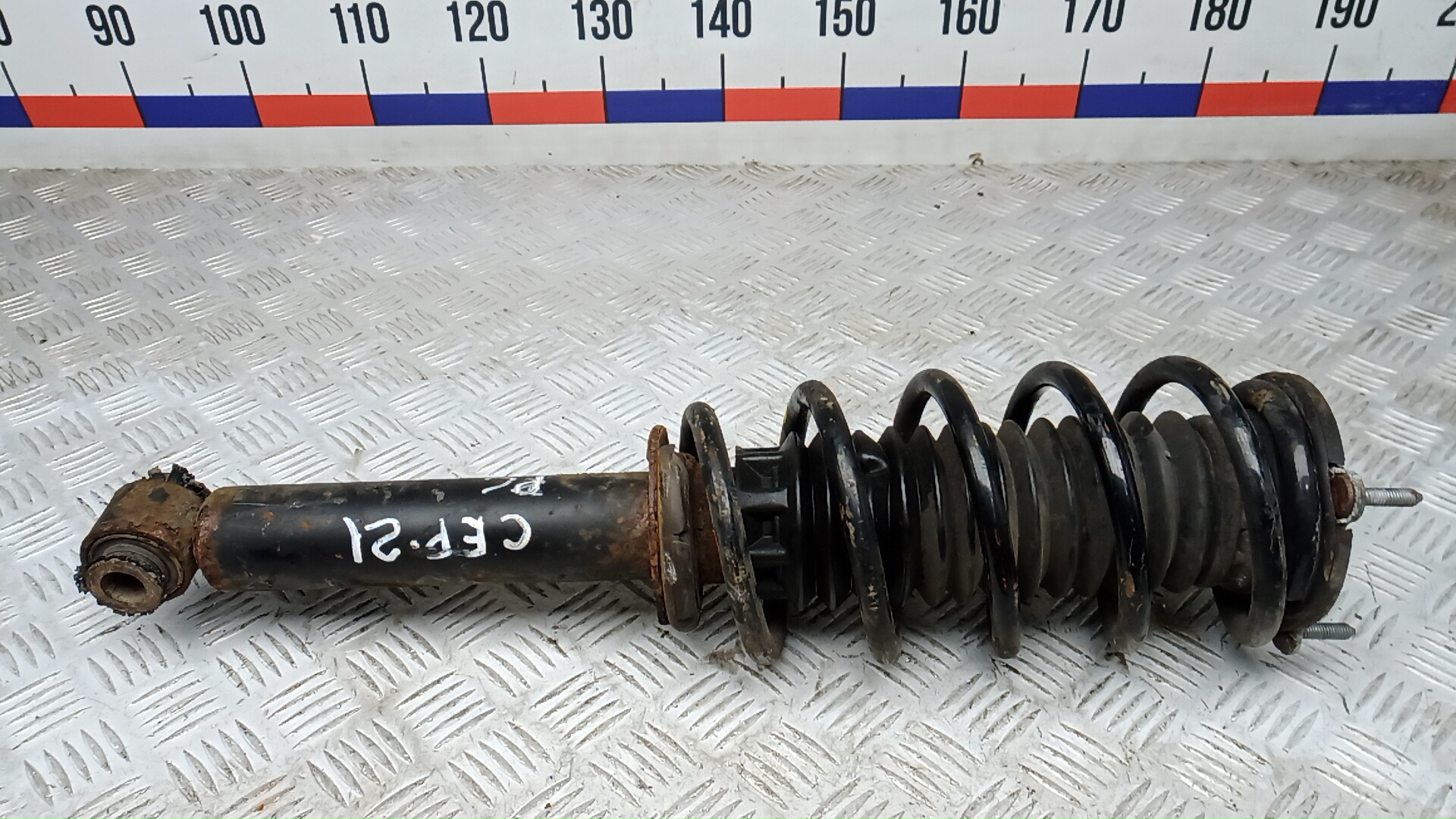 Амортизатор передний левый