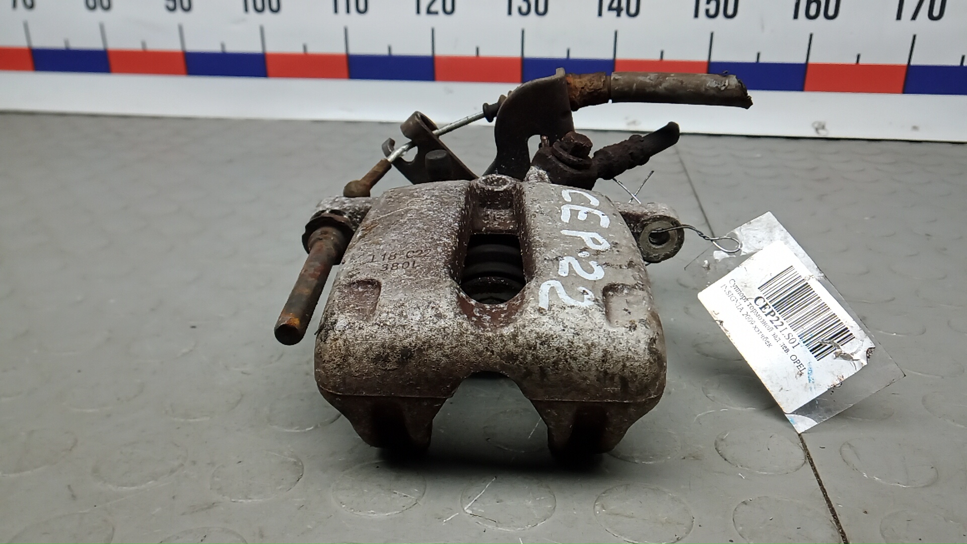 Суппорт задний левый