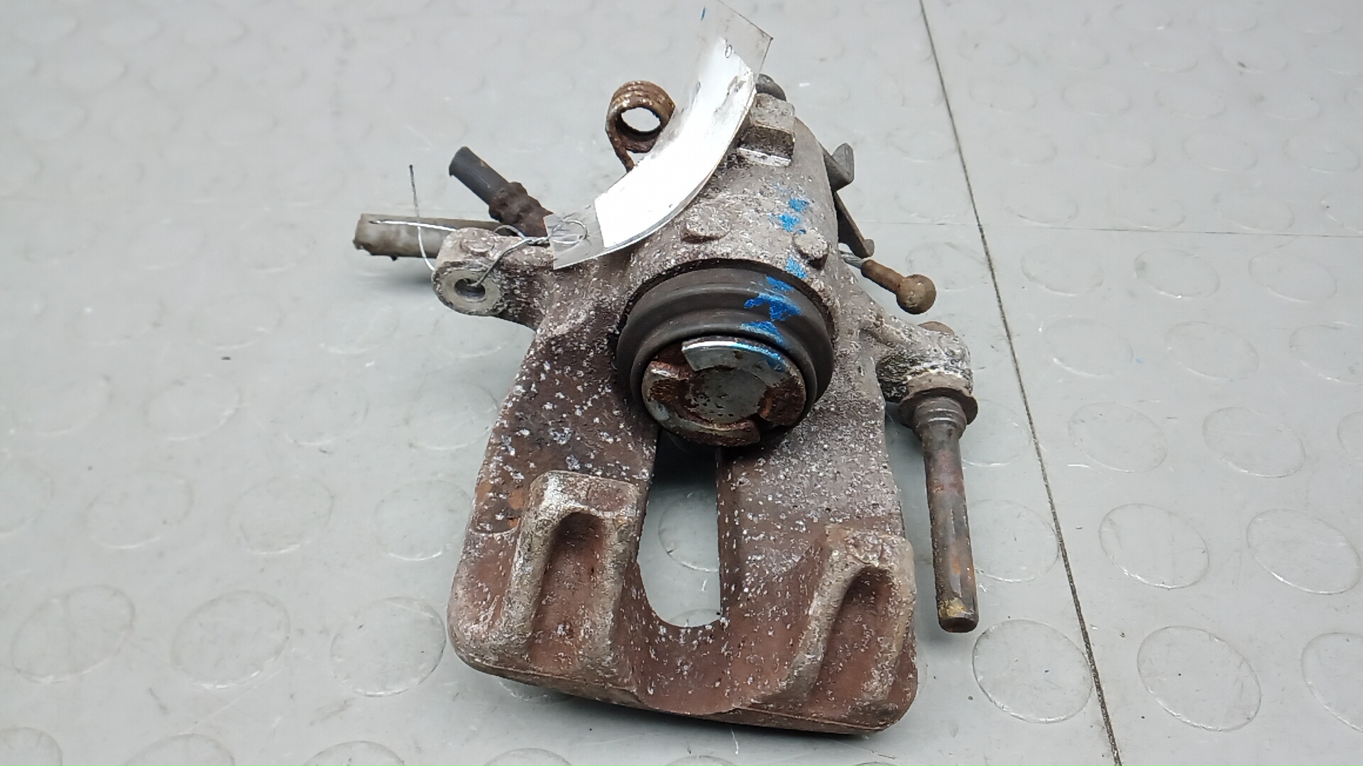 Суппорт задний левый