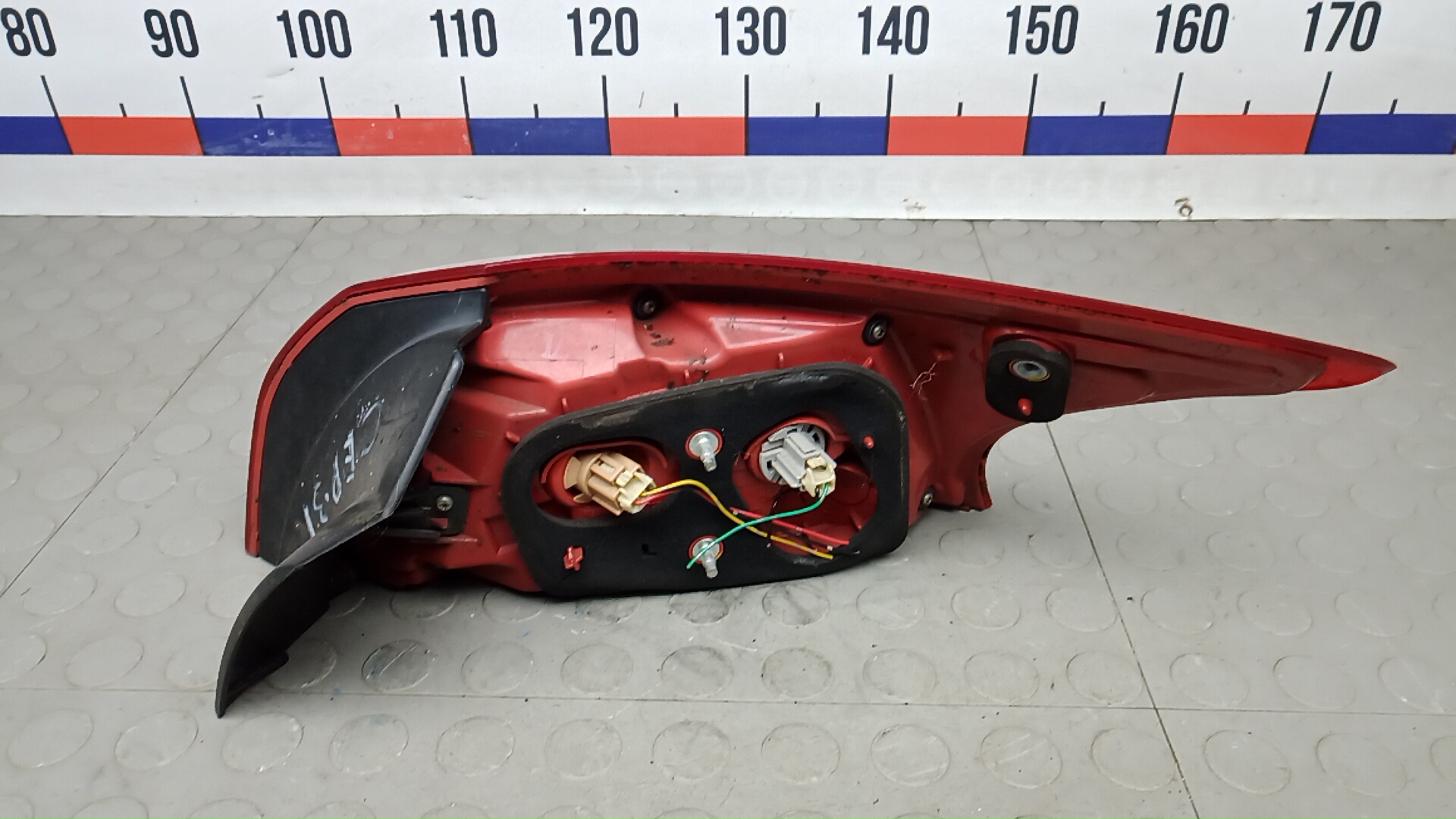 Фонарь задний левый