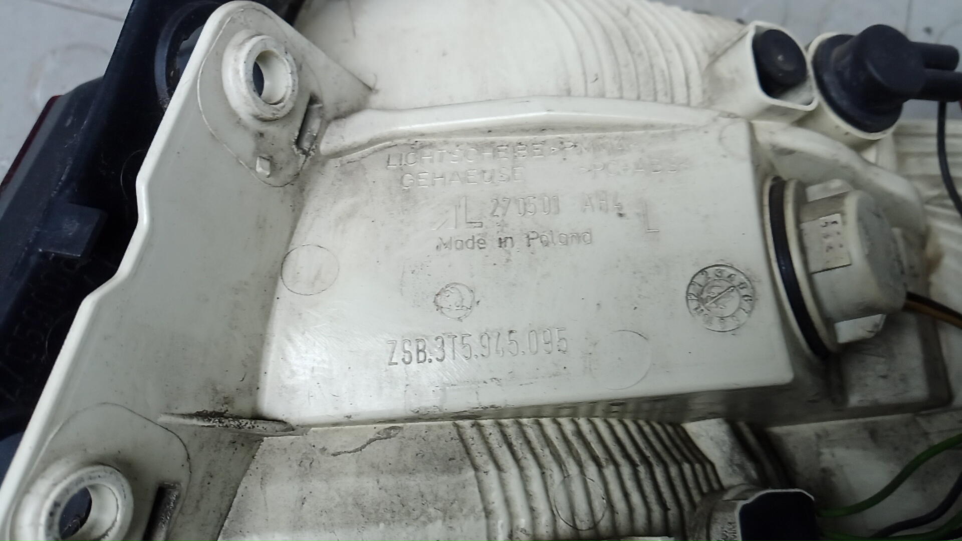 Фонарь задний левый